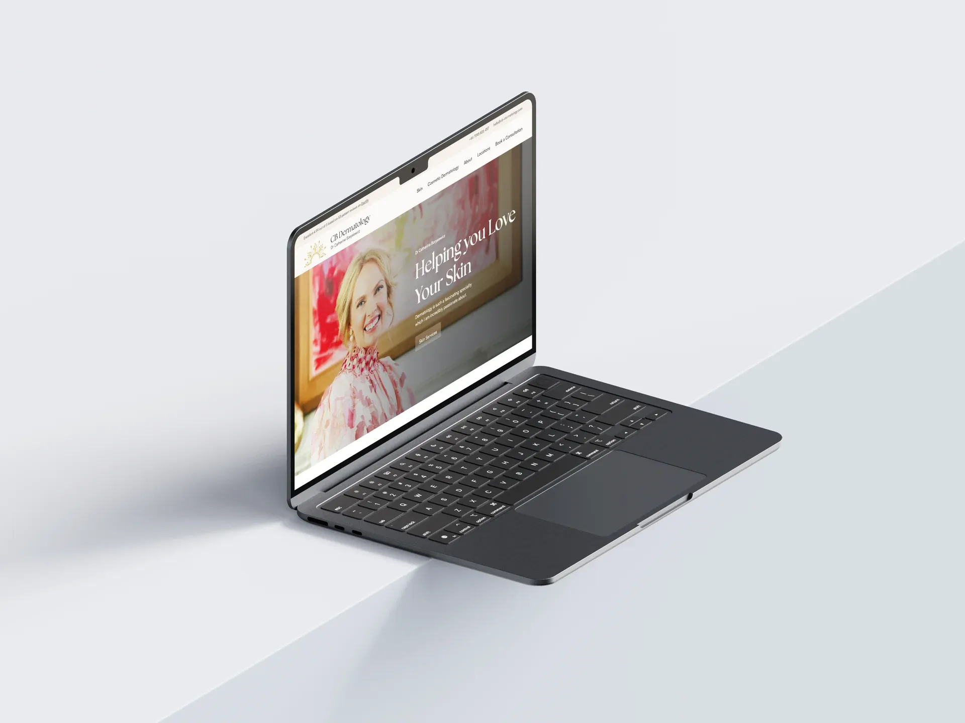 The CB Dermatology website shown on a laptop screen